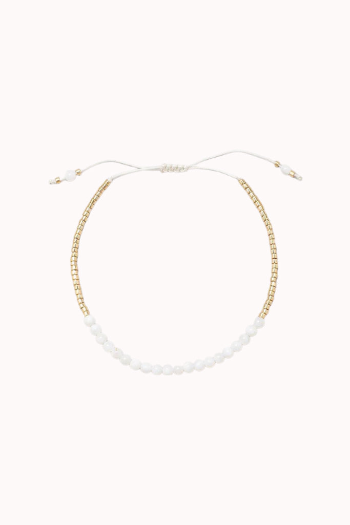 BEADED THREAD PULL BRACELET - WHITE