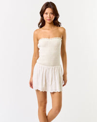 STRAPLESS SMOCK TOP EYELET DRESS