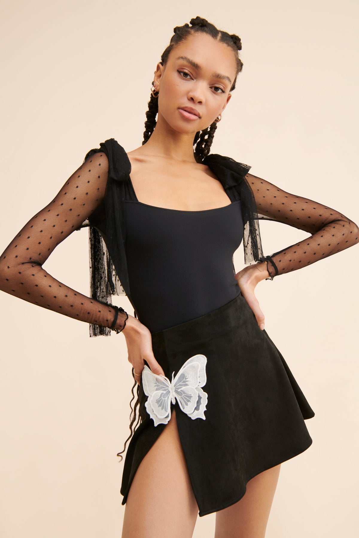 TONGUE TIED BODYSUIT