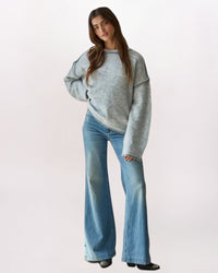 EXPOSED SEAMS ROLL EDGE SWEATER