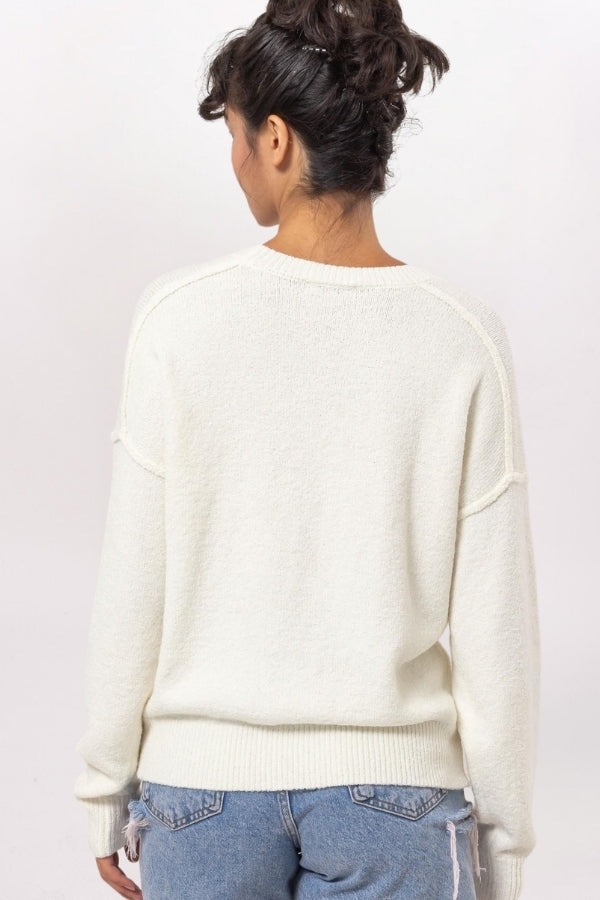 EXPOSED SEAMS SWEATER