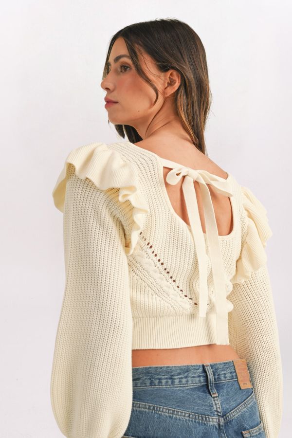 RUFFLE SHOULDER TIE BACK SWEATER